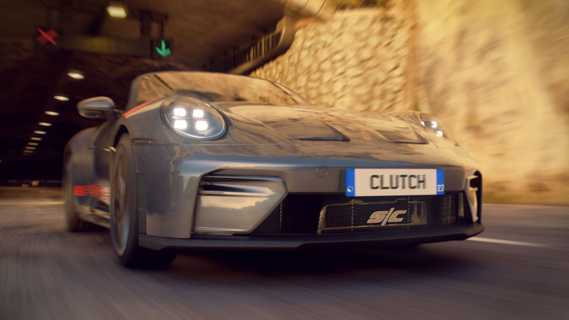 Gray Porsche Sports Car Driving Through a Tunnel Front View with Illuminated Headlights and a Clutch License Plate