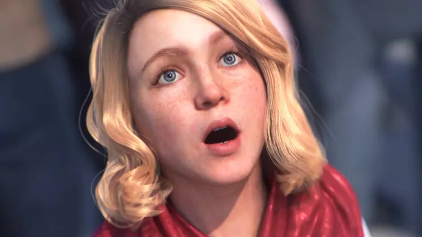 Young Woman with Blonde Hair and Blue Eyes Looks Surprised Mouth Open Wearing a Red Jacketcoat