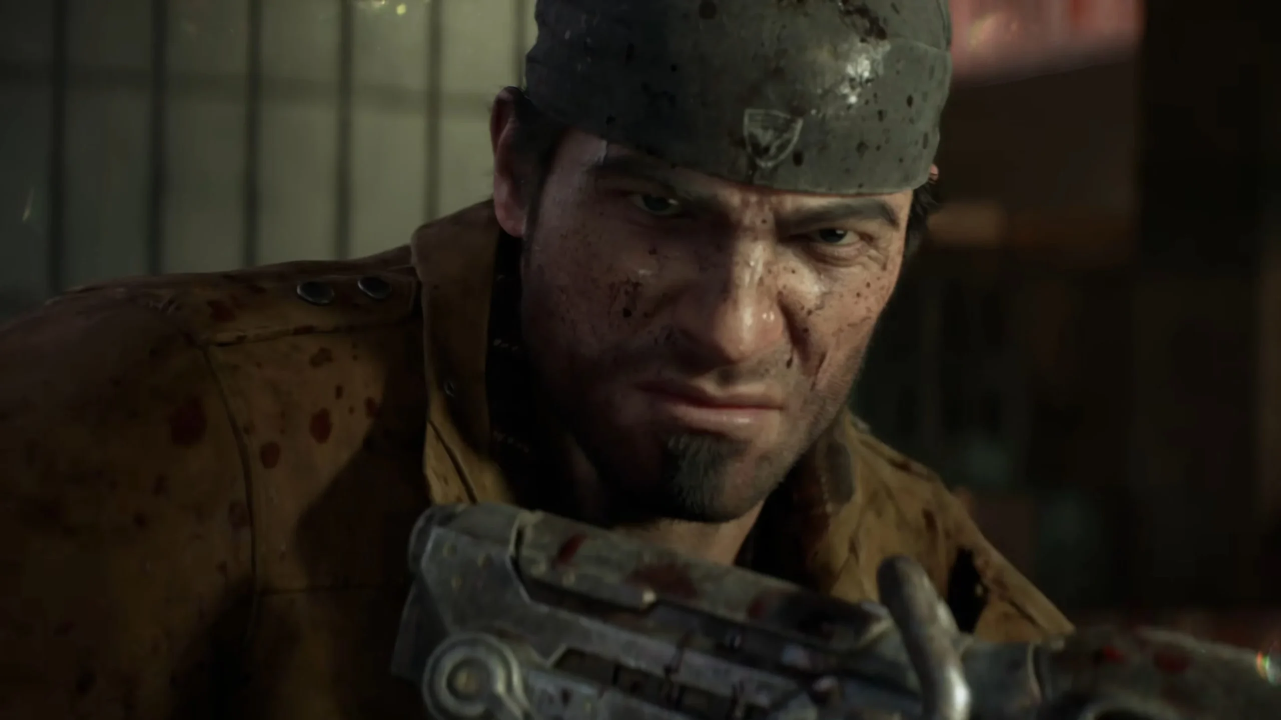 Close up of a Dirt smeared Soldier Wearing a Helmet Gripping a Rifle with a Tense Focused Expression