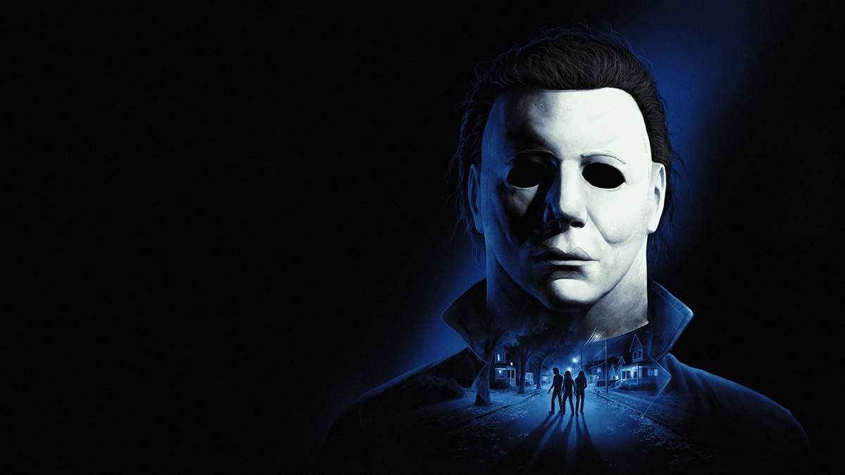 Horror Movie Poster Showing a White Mask with Dark Hair Bathed in Blue Light Above a Small Town Street with Silhouetted Figures